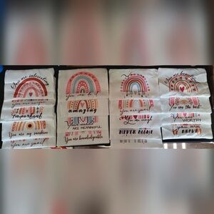 Lot of 18 Assorted Fabric Cosmetic Pouches with Inspirational Quotes.